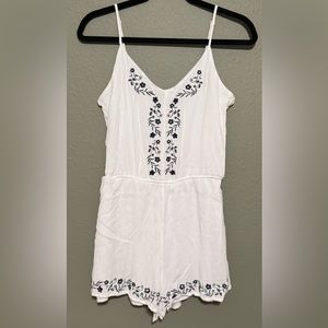 Francesca’s Blue Rain Floral Romper - Size Medium